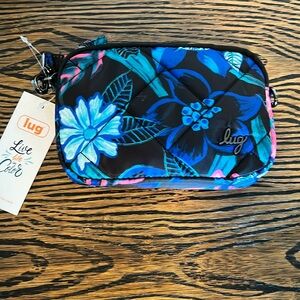 Lug tropical, coupe floral,purse with two zippers and inside zipper pocket.